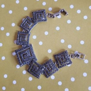 Silver bracelet with black crystals